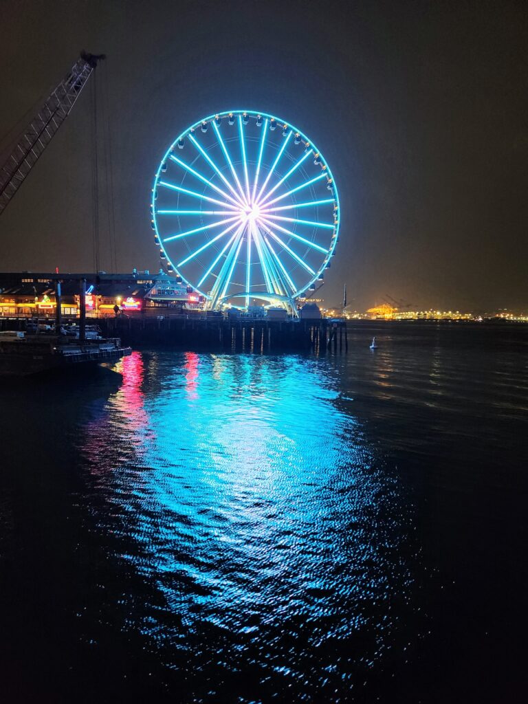 The Great Wheel in Seattle lit up in Teal for Cervical Health Awareness Month