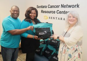 Alegra and Bobby Woodard deliver care packages