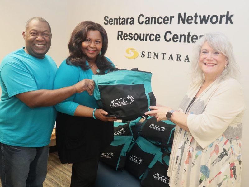 Alegra and Bobby Woodard deliver care packages